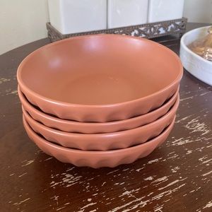 Set of Four Matte Latte Pasta Bowls from Anthropologie in the color Rust